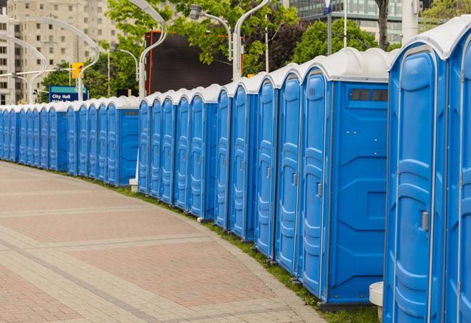 a row of portable restrooms for a special event, ensuring guests have access to clean facilities in Bell City, LA